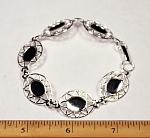 silver color bracelet